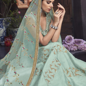 Stylee Lifestyle Turquoise Raw Silk Embroidered Dress Material